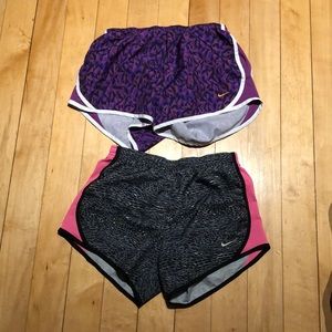 2 pairs of Nike running shorts xl but fits s/m